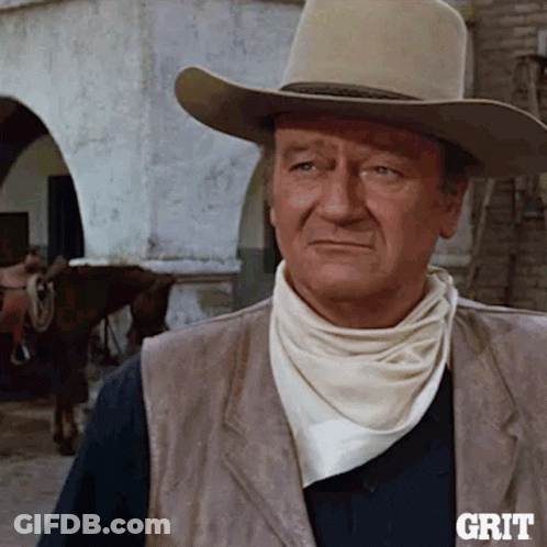 Man In Cowboy Hat And Vest Saying Grit GIF