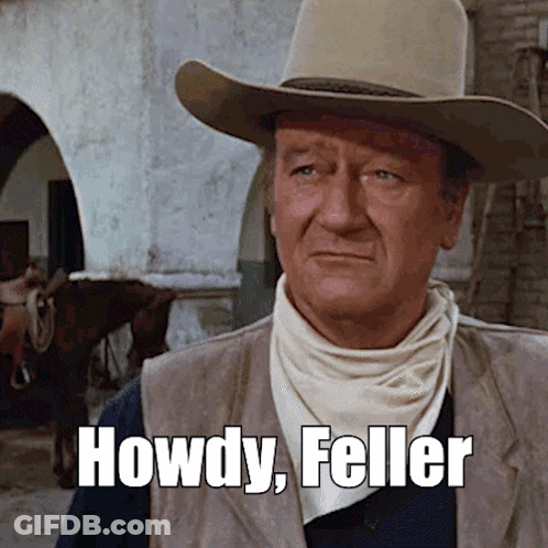 Man In Cowboy Hat And Vest Saying Howdy GIF