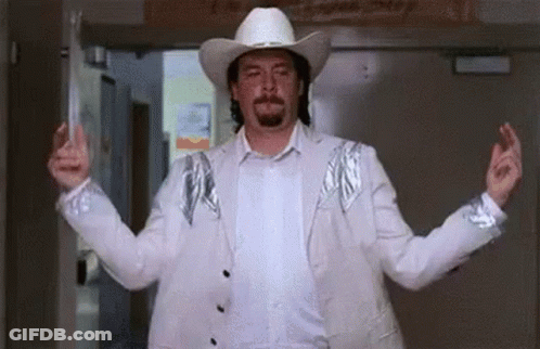 Man In Cowboy Hat And White Jacket GIF