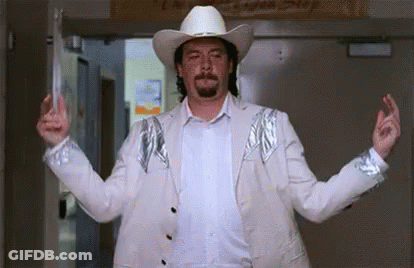 Man In Cowboy Hat And White Jacket GIF