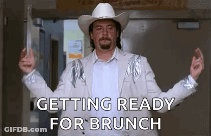 Man In Cowboy Hat And White Suit GIF