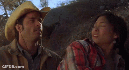 Man In Cowboy Hat And Woman In Plaid Shirt The Universe GIF