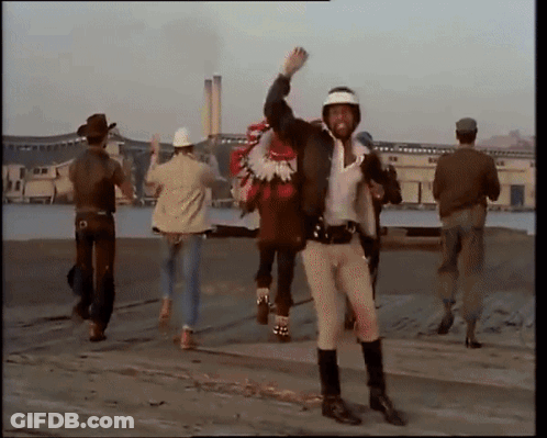 Man In Cowboy Hat Carrying Person On Back GIF