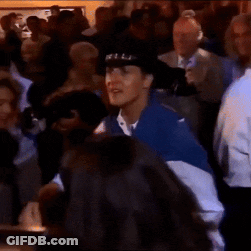 Man In Cowboy Hat Dancing In Crowded Room GIF