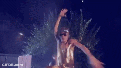 Man In Cowboy Hat Dancing In The Dark GIF