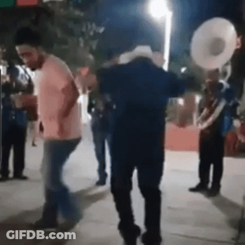 Man In Cowboy Hat Dancing With Band GIF