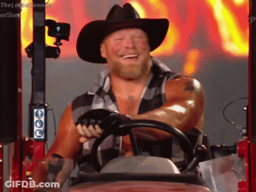 Man In Cowboy Hat Driving Tractor GIF