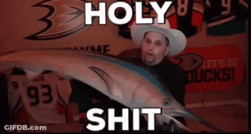 Man In Cowboy Hat Holding Fish With Holy Shit GIF