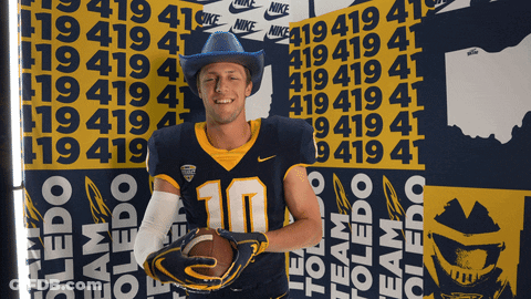 Man In Cowboy Hat Holding Football Toledo Team Wall GIF
