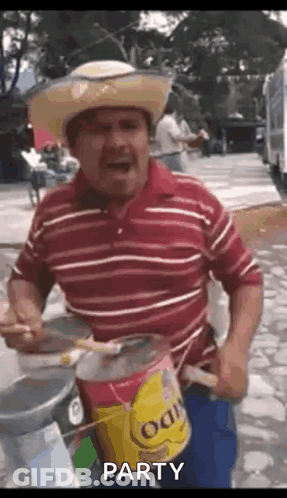 Man In Cowboy Hat Holding Paint Can And Brush GIF