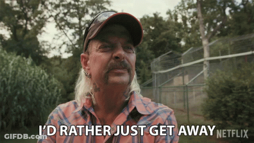 Man In Cowboy Hat Holding Small White Tiger GIF