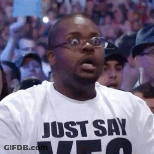 Man In Cowboy Hat In Front Of Jim Ross Sign GIF