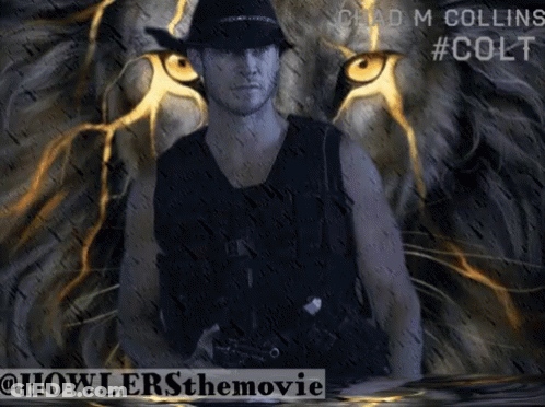 Man In Cowboy Hat In Front Of Lion's Eye GIF