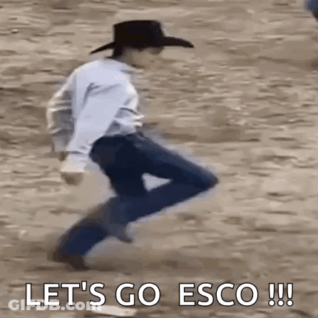 Man In Cowboy Hat Jumping In Dirt With Let's Go Esco GIF