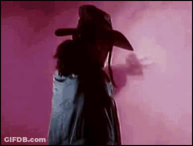 Man In Cowboy Hat On Pink Background GIF