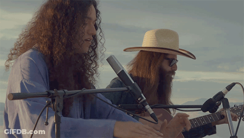 Man In Cowboy Hat Playing Guitar And Singing GIF