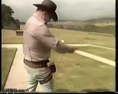 Man In Cowboy Hat Pointing Gun At Target GIF