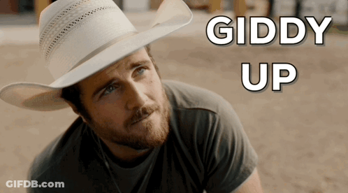 Man In Cowboy Hat Saying Giddy Up GIF