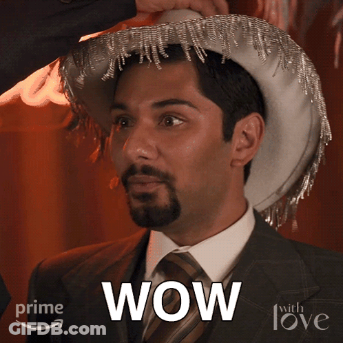 Man In Cowboy Hat Saying Wow GIF
