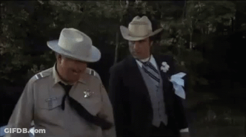 Man In Cowboy Hat Says What The Hell Is The World Comin' To GIF
