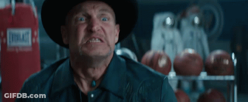 Man In Cowboy Hat Screaming In Dark Room GIF