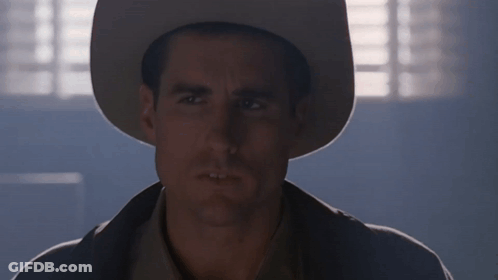 Man In Cowboy Hat Serious Look GIF