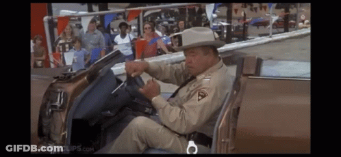 Man In Cowboy Hat Sitting In Car GIF