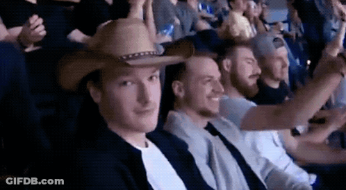 Man In Cowboy Hat Sitting GIF