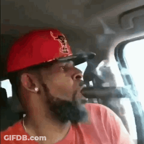 Man In Cowboy Hat Smoking Cigar GIF