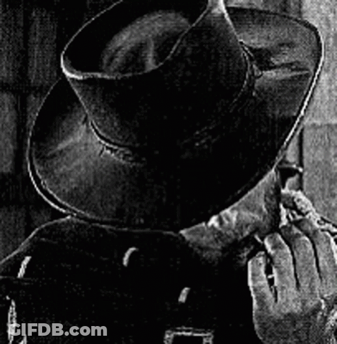 Man In Cowboy Hat Smoking Cigarette GIF