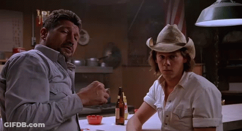 Man In Cowboy Hat Smoking With Man In White Shirt GIF