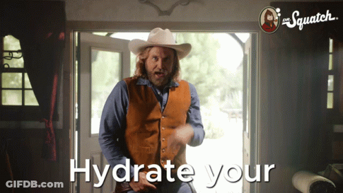 Man In Cowboy Hat Standing By Hydrate Your Door GIF