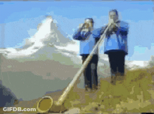 Man In Cowboy Hat Standing In Desert With Hands Up GIF