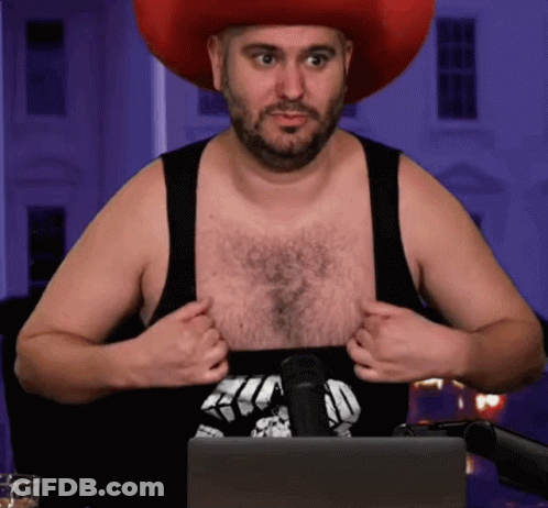 Man In Cowboy Hat Taking Off Black Tank Top GIF