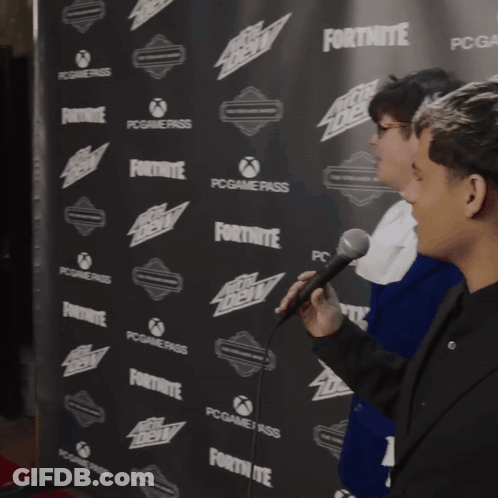 Man In Cowboy Hat Talking Into Microphone Fortnite Backdrop GIF