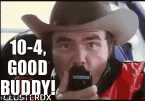 Man In Cowboy Hat Talking On Phone Eating Chips GIF