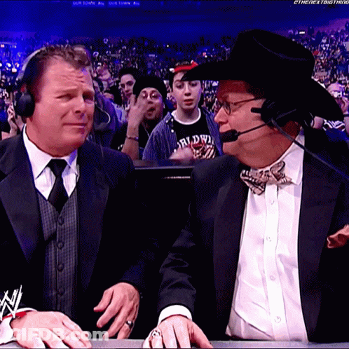 Man In Cowboy Hat Talking To Man In Suit GIF