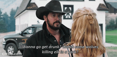 Man In Cowboy Hat Talking To Woman In Front Of House GIF