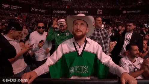 Man In Cowboy Hat Wearing Mexico Shirt GIF