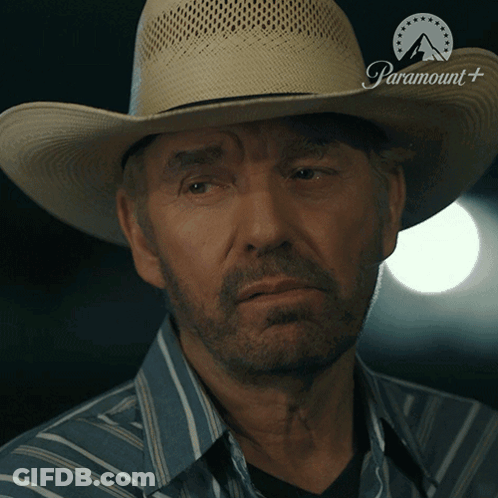 Man In Cowboy Hat With Paramount Logo Shirt GIF