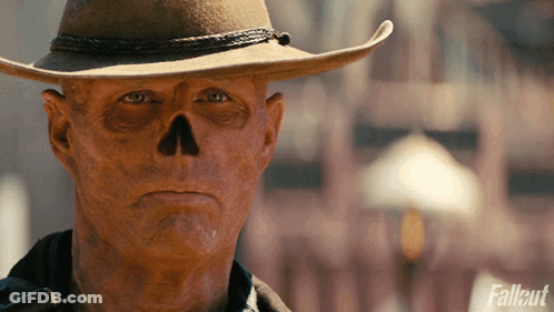 Man In Cowboy Hat With Skull On Face GIF
