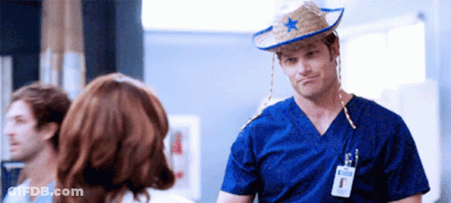 Man In Cowboy Hat With Star GIF