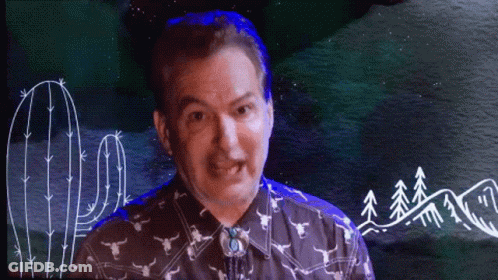 Man In Cowboy Shirt And Bow Tie GIF