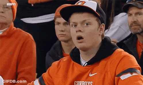 Man In Cowboys Jersey Surprised Watching Game GIF