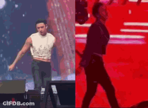 Man In Crop Top Next To Man In Black Jacket GIF