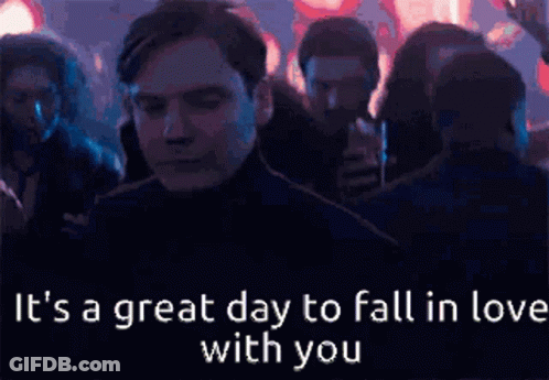 Man In Crowd Saying It's A Great Day To Fall In Love With You GIF