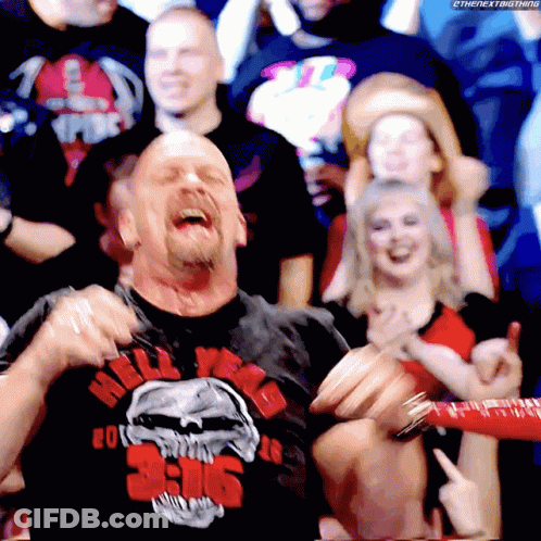 Man In Crowd Wearing 3:16 Shirt GIF