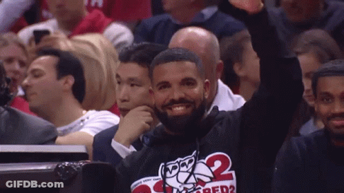 Man In Crowd With '2' Shirt GIF