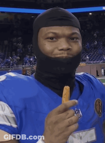 Man In Crown And Fur Coat Praying Before Crowd GIF