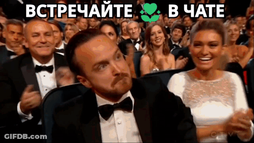 Man In Crown And Purple Robe Smiling GIF